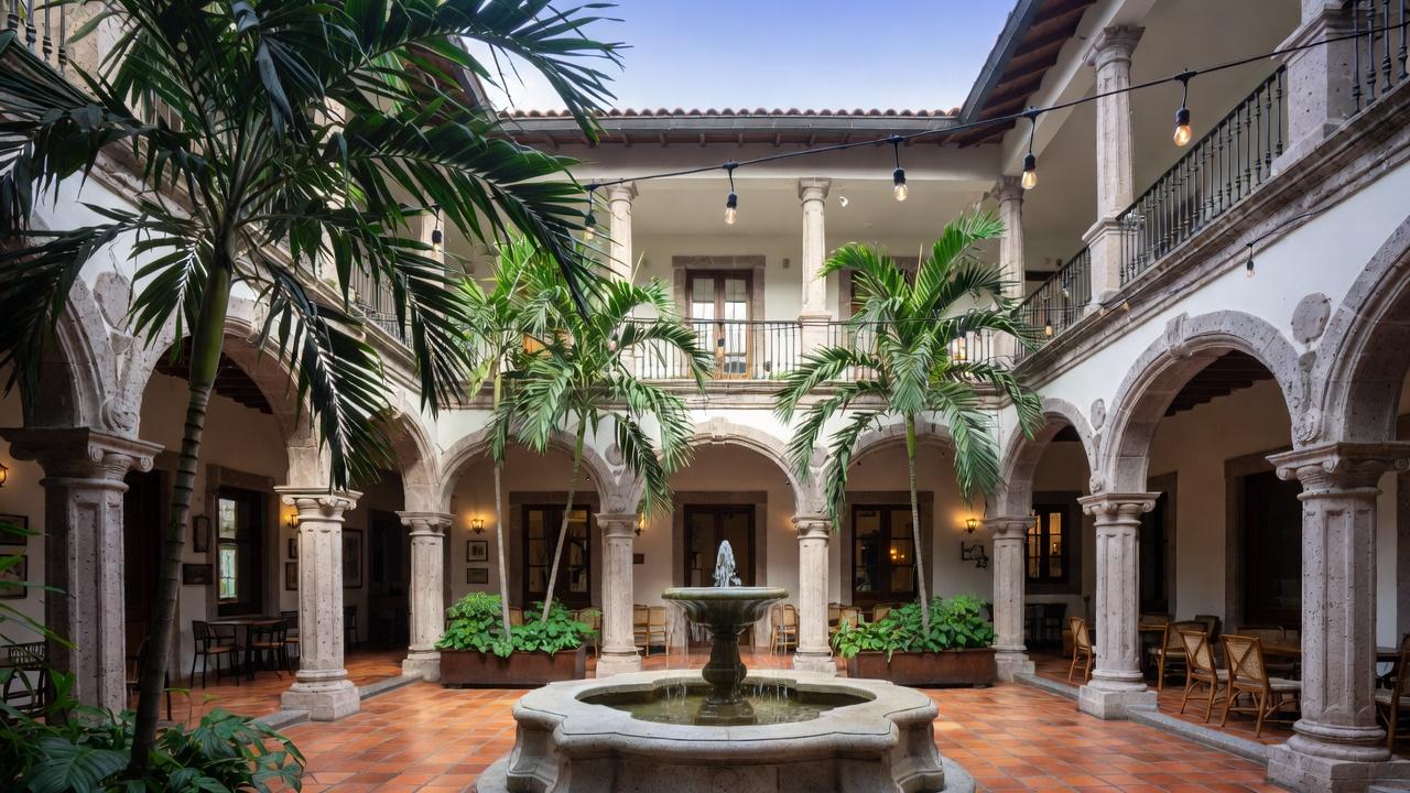 A large colonial building with a clock tower in Oaxaca